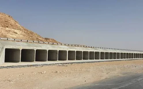Multi-cell box culvert drainage structure alongside a desert road